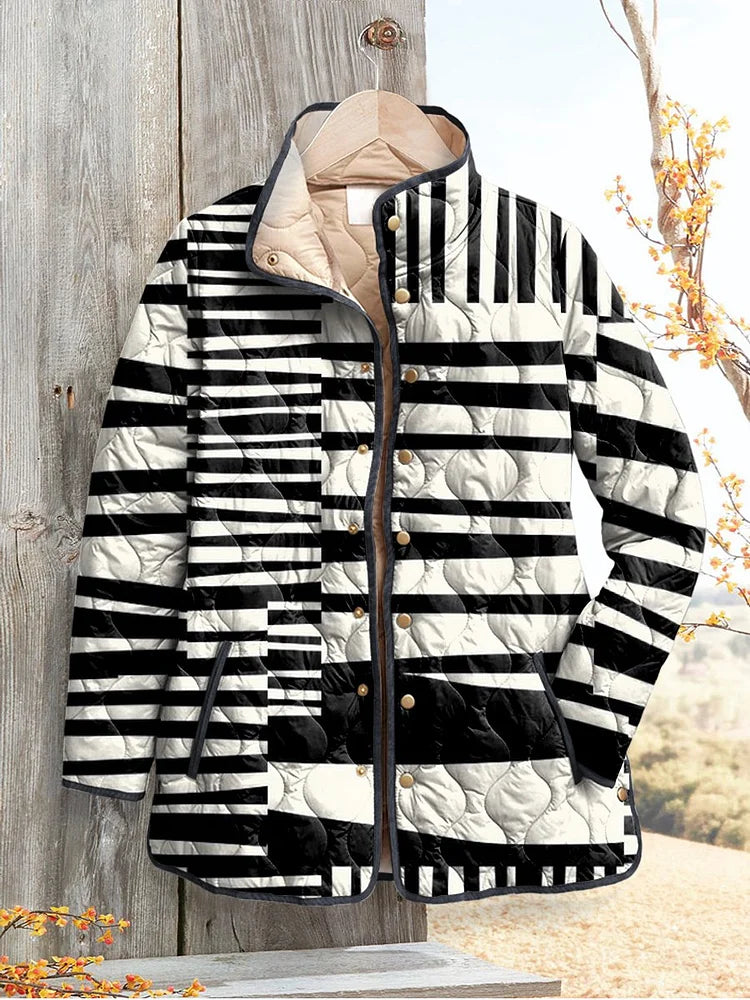 Women's black and white abstract quilted jacket in a casual style